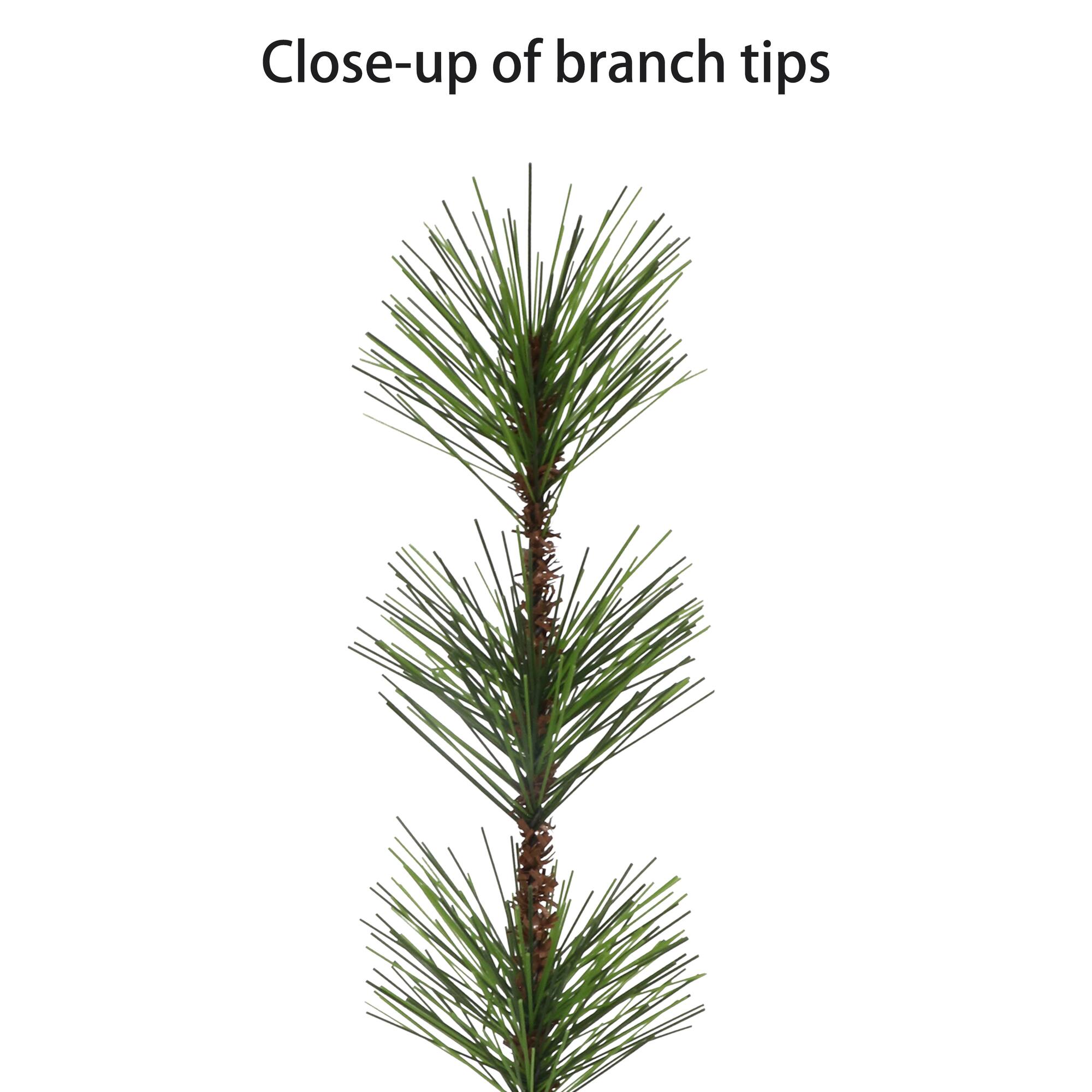 4ft. Pre-Lit Spruce Artificial Potted Christmas Tree in Rattan Base, Clear Lights